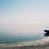 abandoned boat on the edge of sand in saltonsea