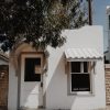 white adobe building in marfa, texas