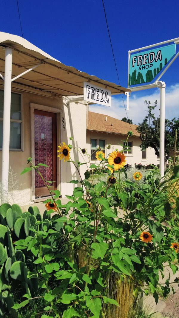 "freda" shop with sunflowers in front