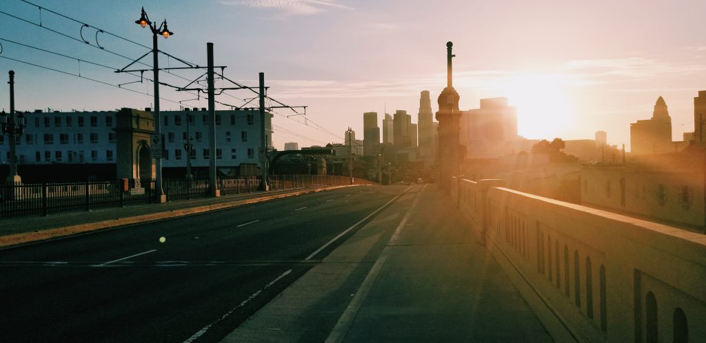 sunset photo of road and buildings in los angeles, california
