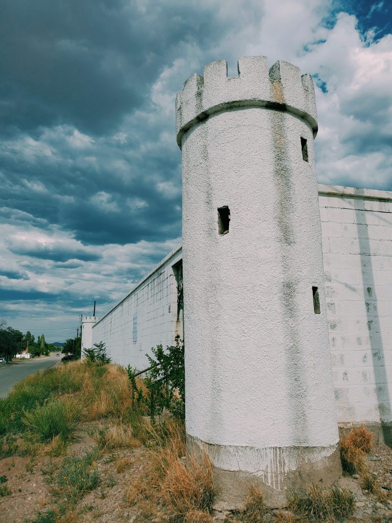 castle under dark blue clouds