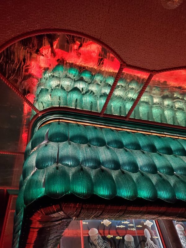 pink and green glass over a bar in las vegas, nevada