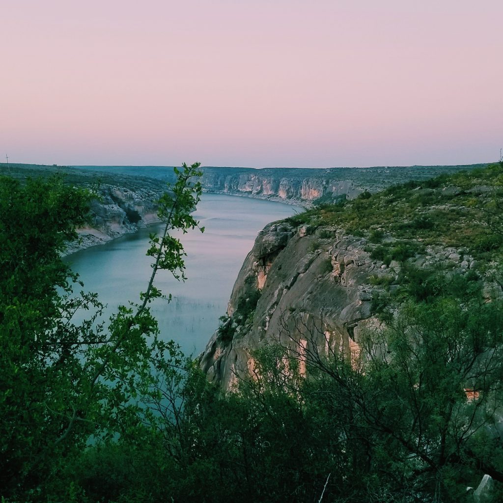 pink sky overlooks river