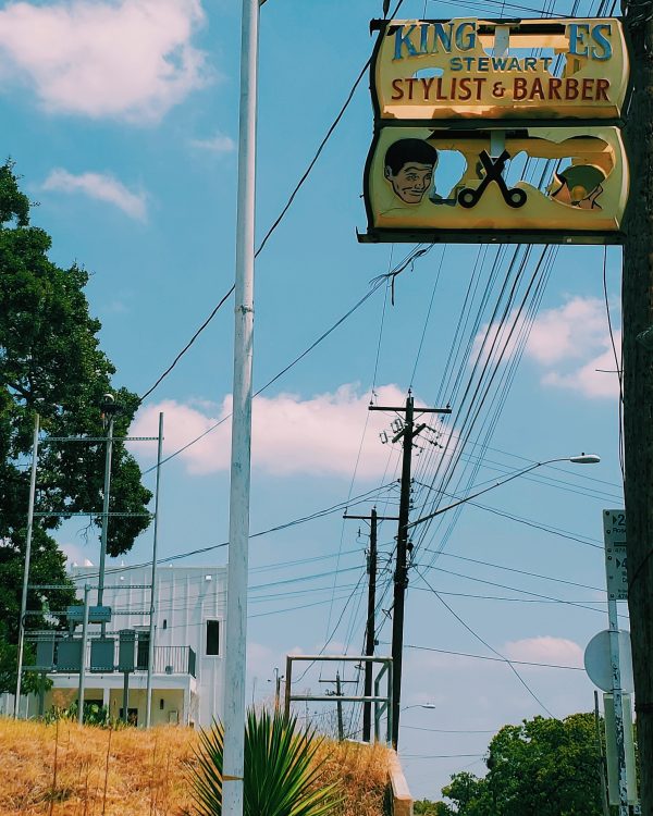 photo of dilapidated sign in austin, texas