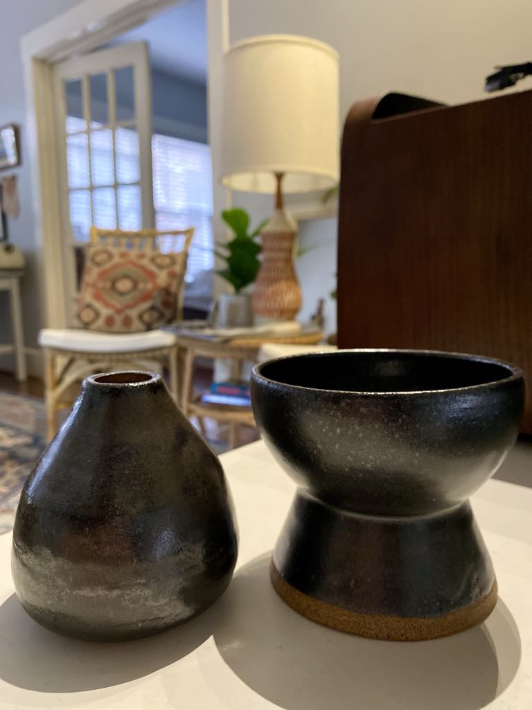 two black ceramic vases